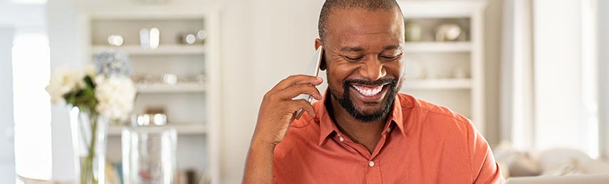 Man smiling on phone